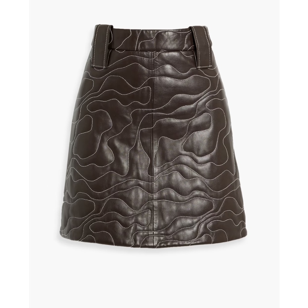 A-line skirt w/ topstitching. High waist w/ belt loops. Exposed zipper at back.